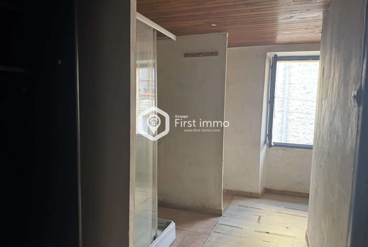 Maison de village à vendre à Ille-sur-Têt avec terrasse et potentiel de rénovation 