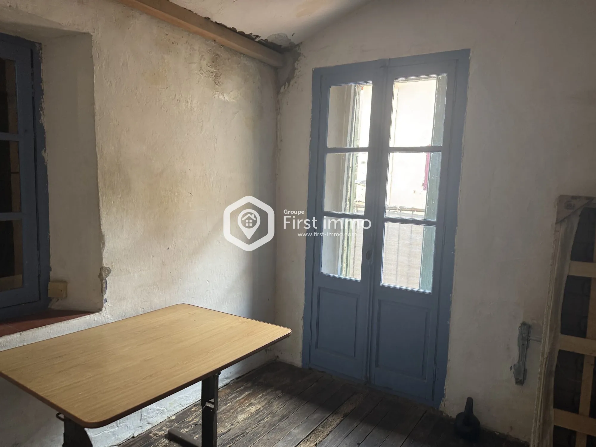 Maison de village à vendre à Ille-sur-Têt avec terrasse et potentiel de rénovation 