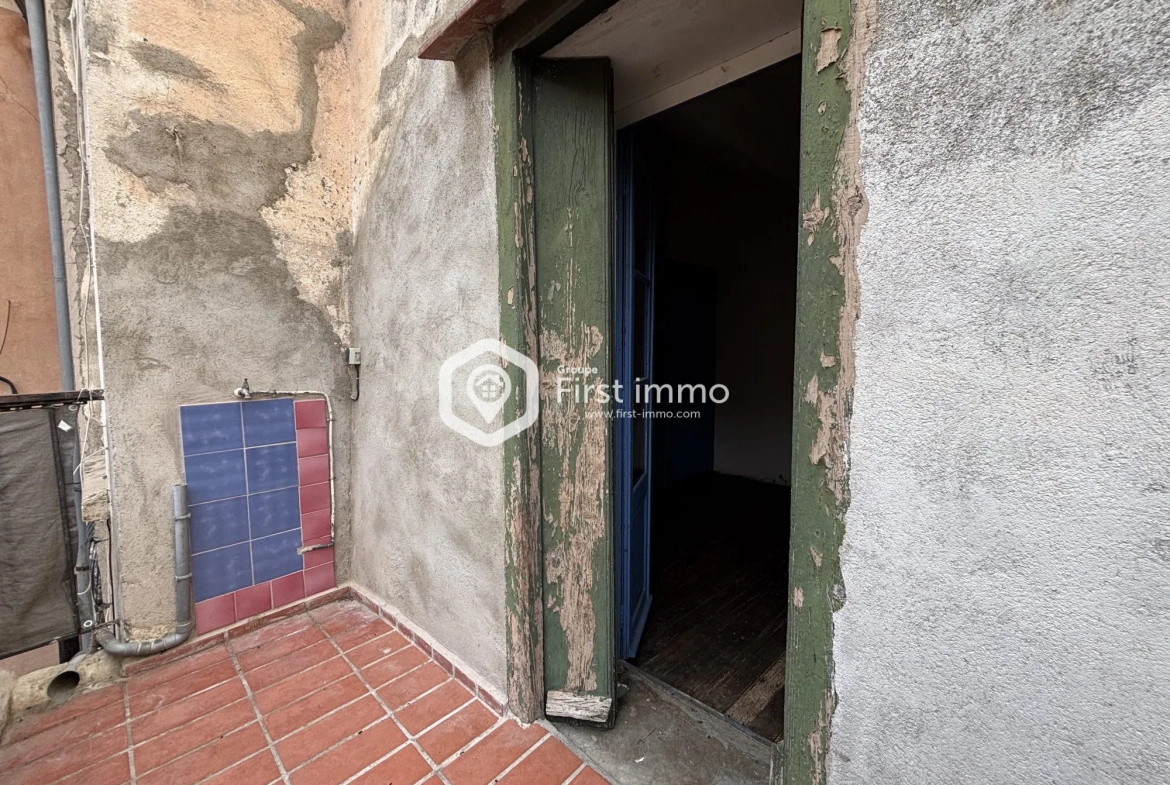 Maison de village à vendre à Ille-sur-Têt avec terrasse et potentiel de rénovation 
