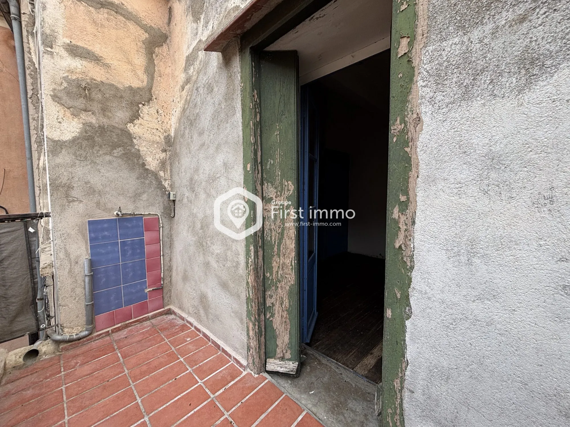 Maison de village à vendre à Ille-sur-Têt avec terrasse et potentiel de rénovation 