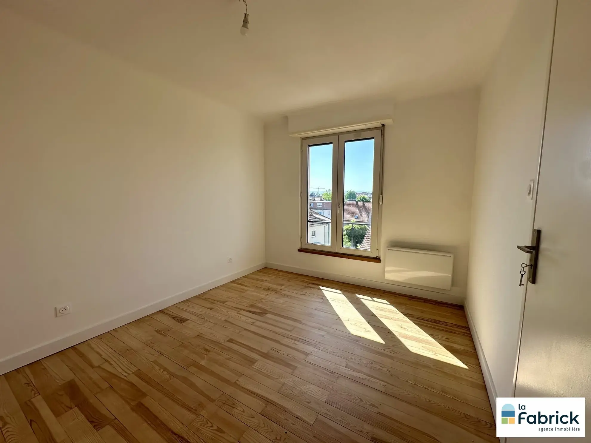Appartement 3 pièces rénové à Lingolsheim, 68 m² avec balcon et cave 
