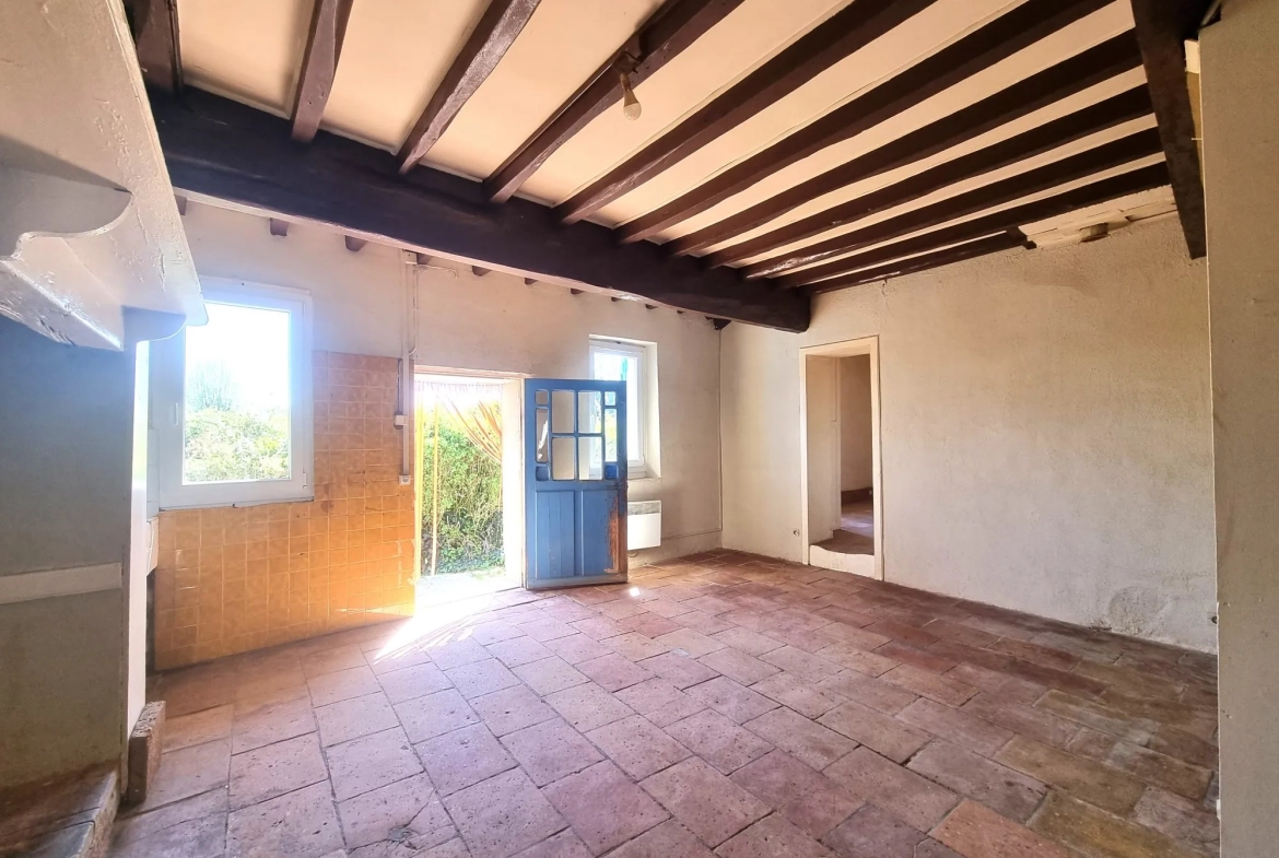 Maison à vendre au Le Burgaud – Potentiel à rénover, 53 m², garage et jardin 