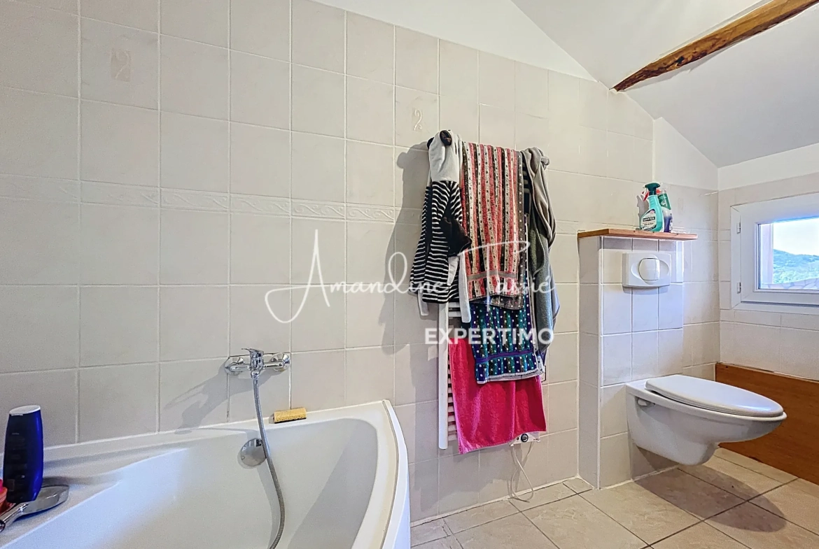 Appartement duplex de 78,94 m² à Saint-Rome-de-Tarn – Charme et authenticité 