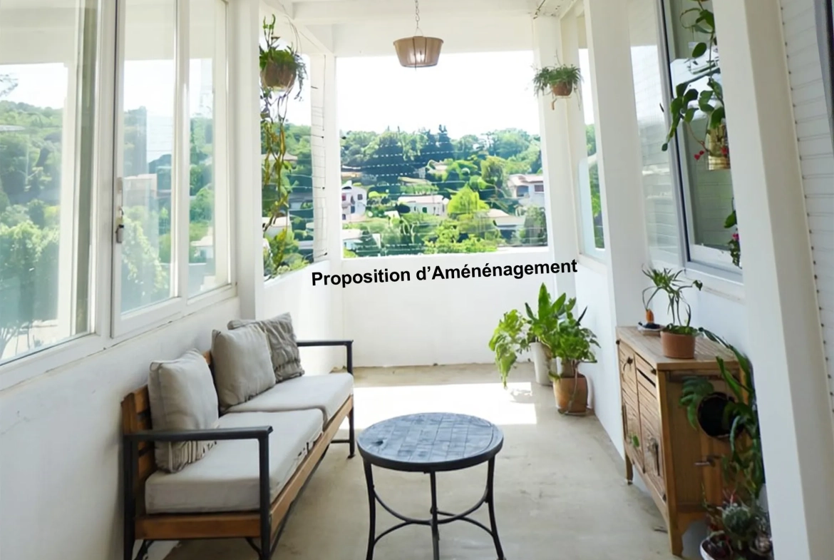 Appartement lumineux de 94 m2 à Lamalou-les-Bains avec véranda et vue dégagée 