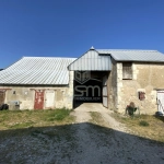 Grande grange à aménager à Sorigny, potentiel pour artisan ou investisseurs