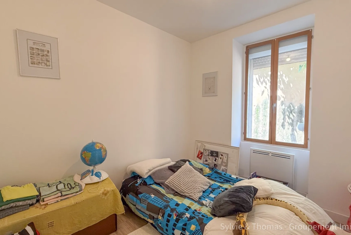 Appartement de plain-pied lumineux à Caderousse, proximité commerces et tranquillité 