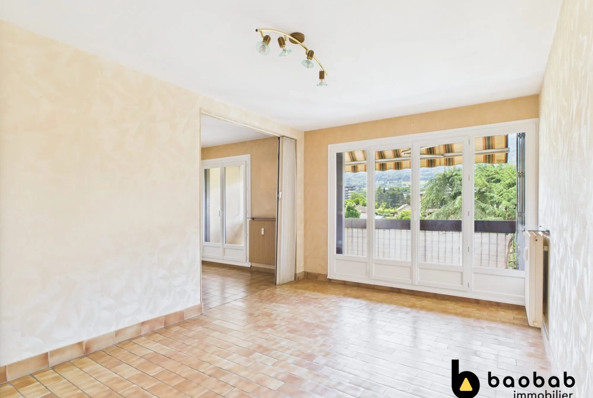 Appartement T3/4 à La Motte-Servolex avec balcon et cave, au centre-ville 