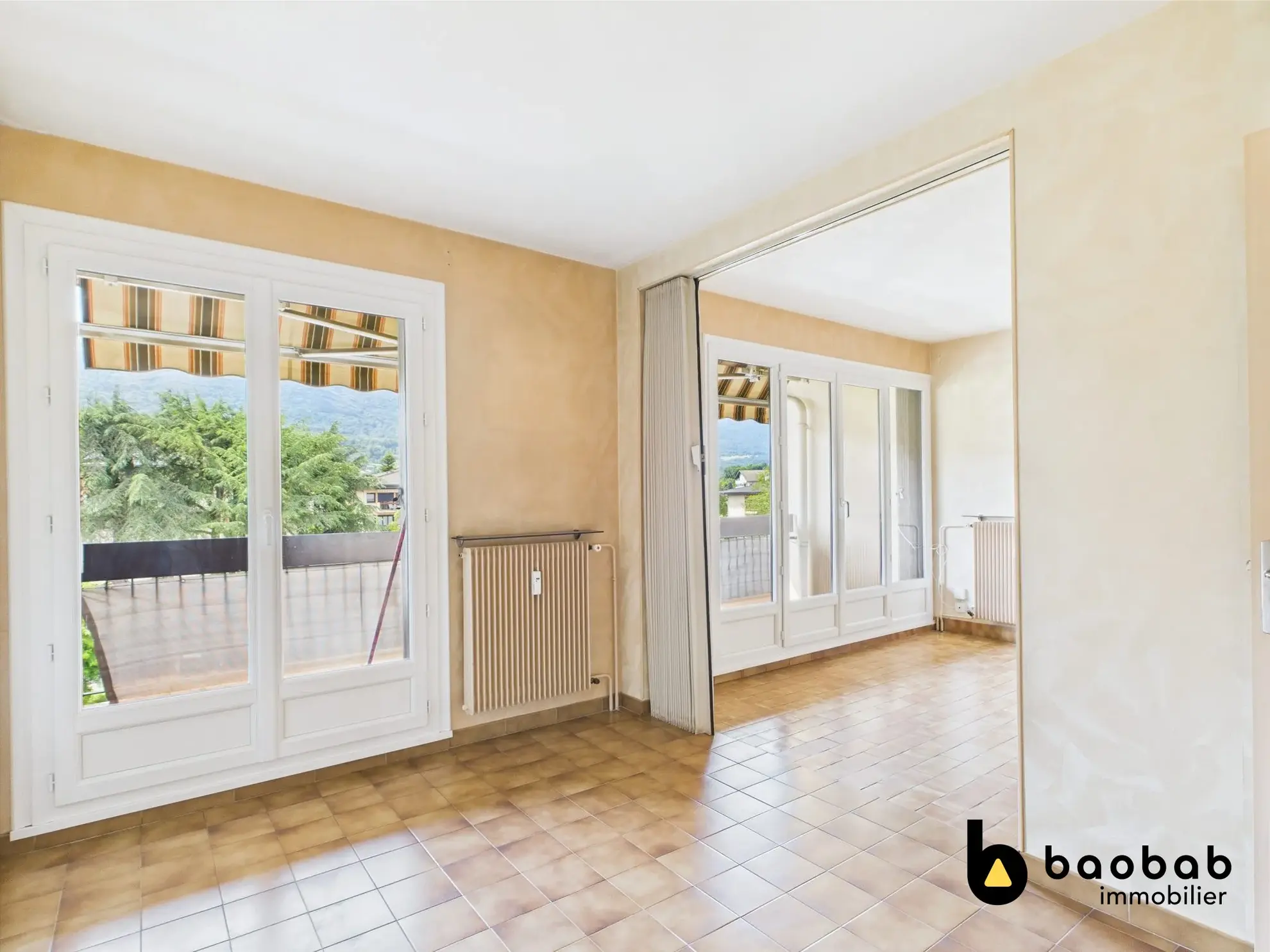 Appartement T3/4 à La Motte-Servolex avec balcon et cave, au centre-ville 