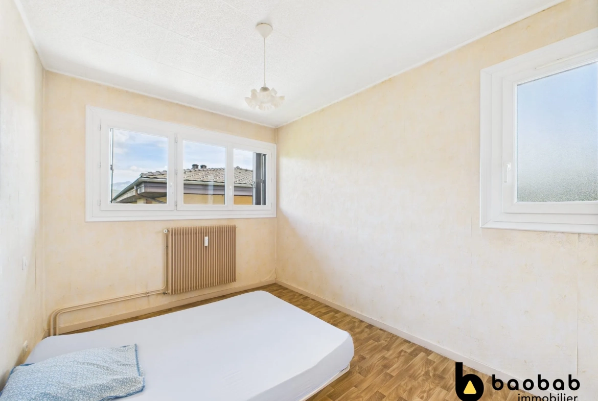 Appartement T3/4 à La Motte-Servolex avec balcon et cave, au centre-ville 