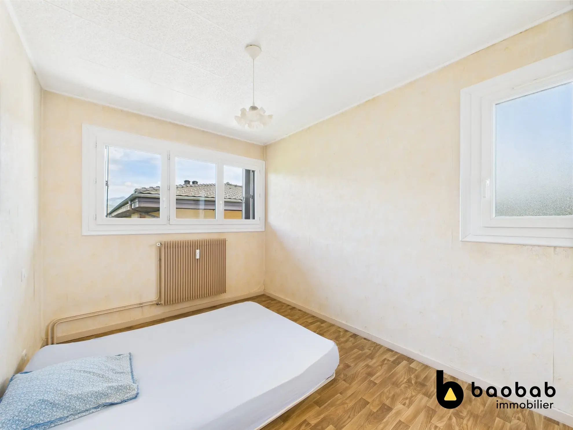 Appartement T3/4 à La Motte-Servolex avec balcon et cave, au centre-ville 