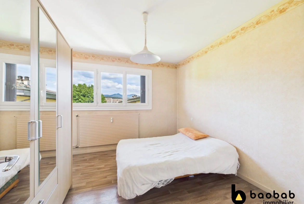Appartement T3/4 à La Motte-Servolex avec balcon et cave, au centre-ville 