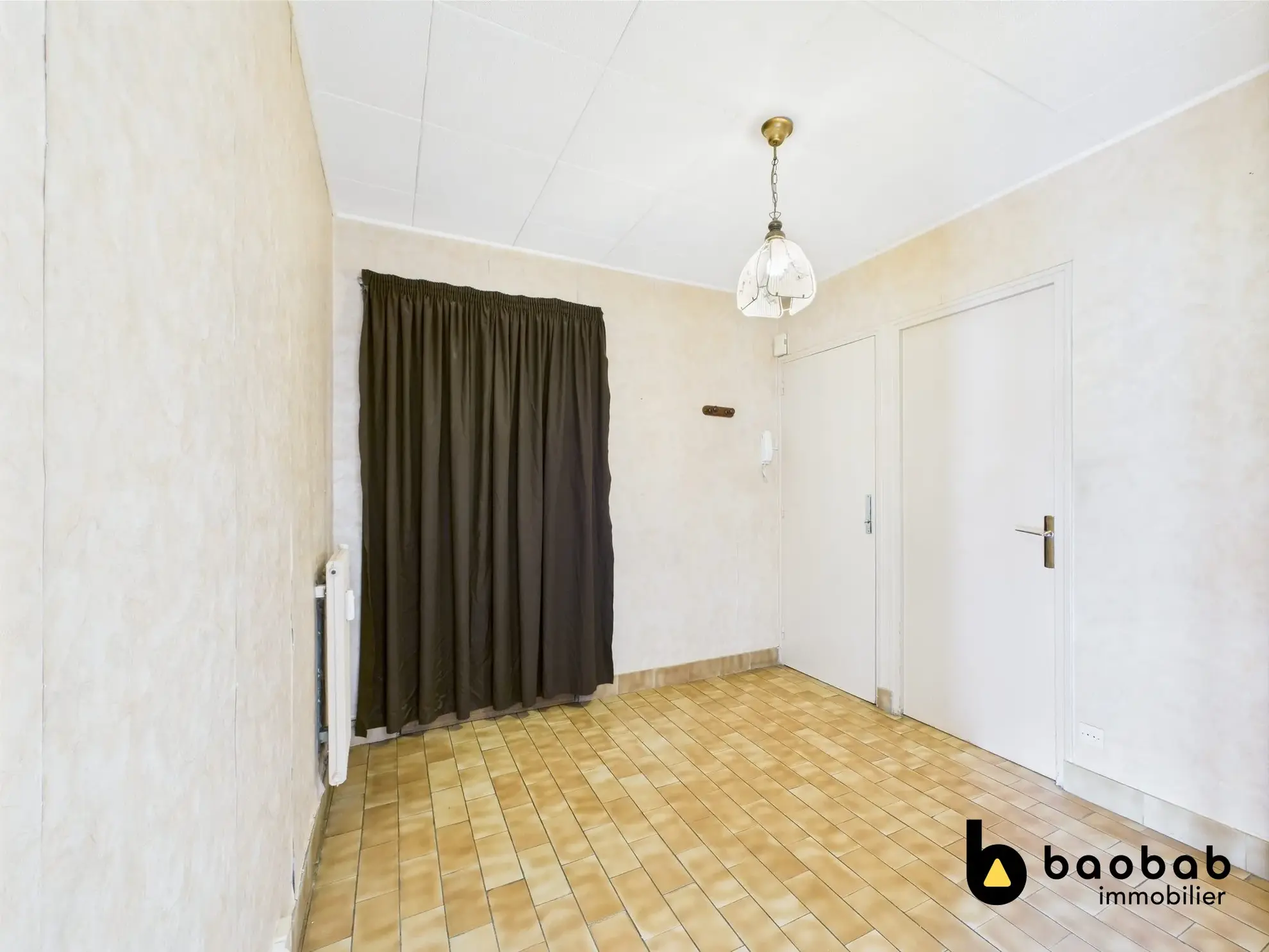 Appartement T3/4 à La Motte-Servolex avec balcon et cave, au centre-ville 