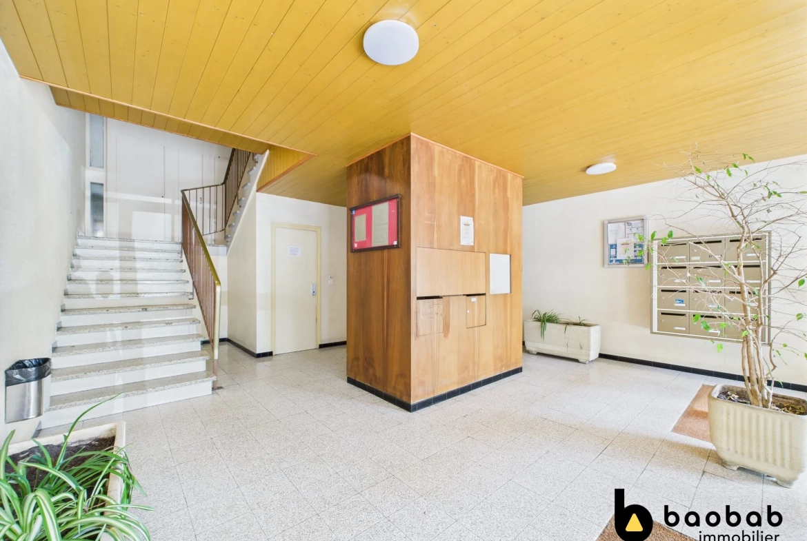 Appartement T3/4 à La Motte-Servolex avec balcon et cave, au centre-ville 