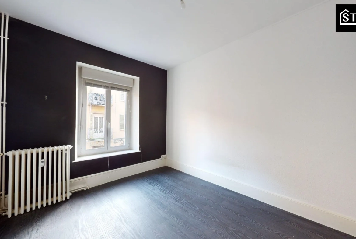 Appartement à vendre à Belfort - 2 chambres, proximité écoles et commerces 