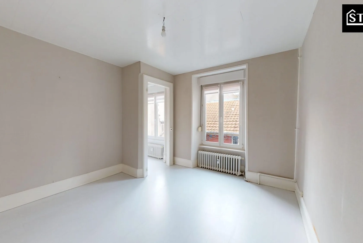 Appartement à vendre à Belfort - 2 chambres, proximité écoles et commerces 