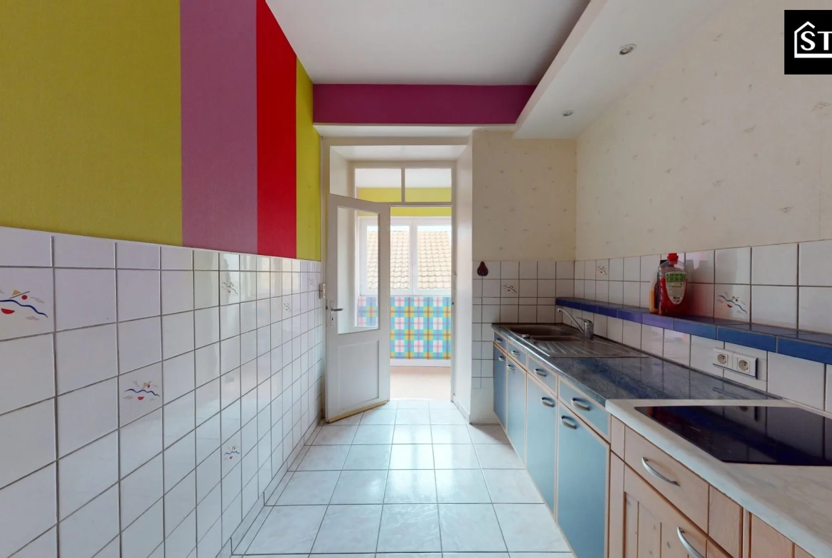 Appartement à vendre à Belfort - 2 chambres, proximité écoles et commerces 