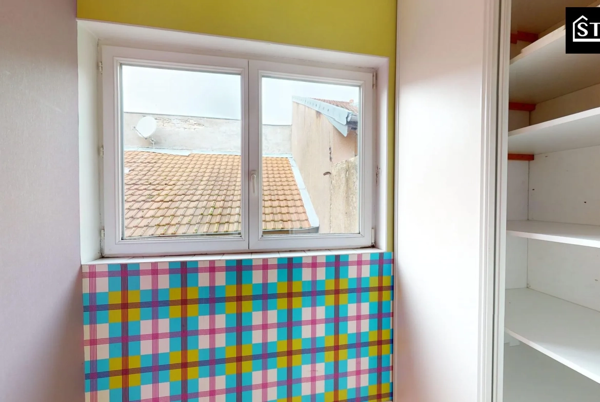 Appartement à vendre à Belfort - 2 chambres, proximité écoles et commerces 