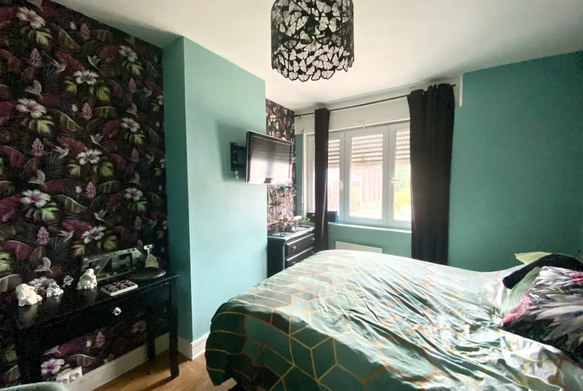 Belle maison familiale à vendre à Maubeuge, 3 chambres, jardin et garage, secteur calme 