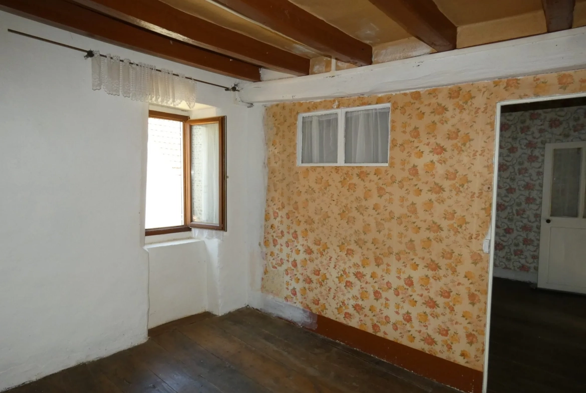 Maison de village en pierre avec dépendance et jardin à Cressat 