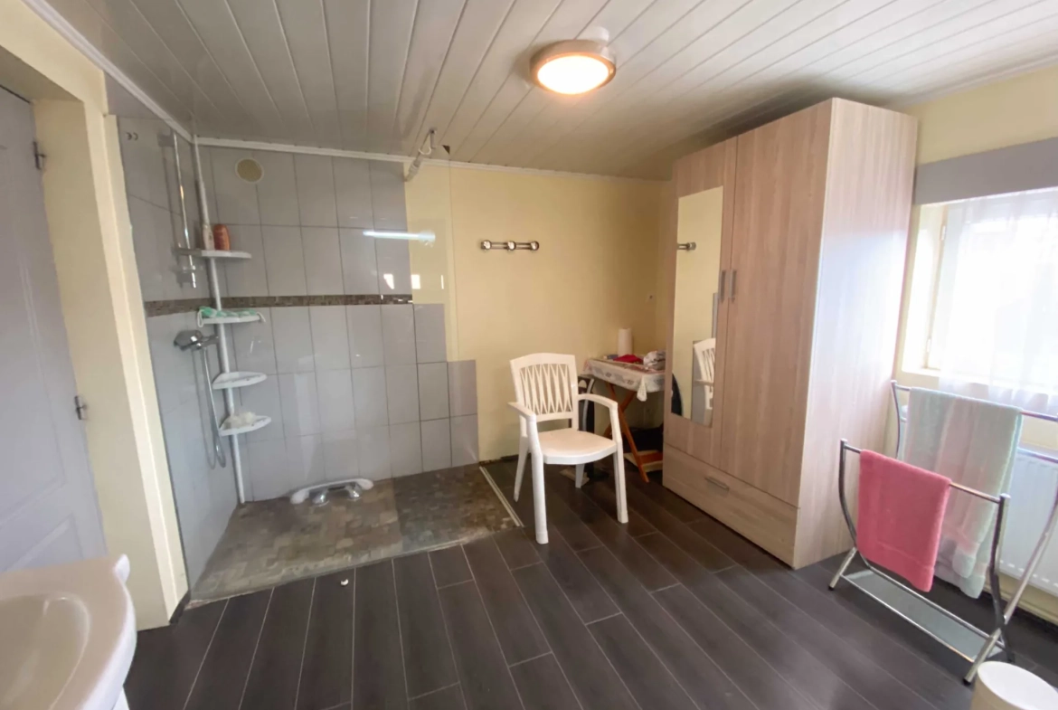 Maison semi-individuelle à Assevent avec jardin et garage, calme et lumineuse 