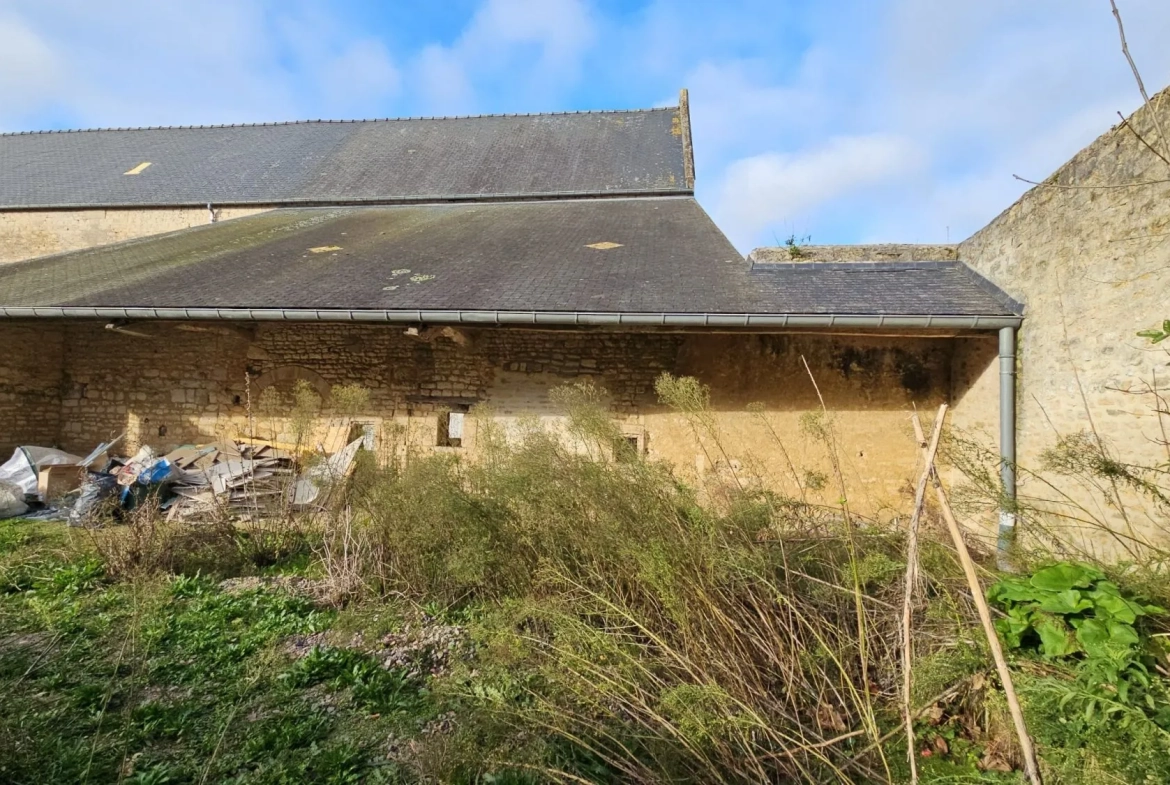 Lot de 3 granges à rénover dans un corps de ferme à Moulins-en-Bessin 