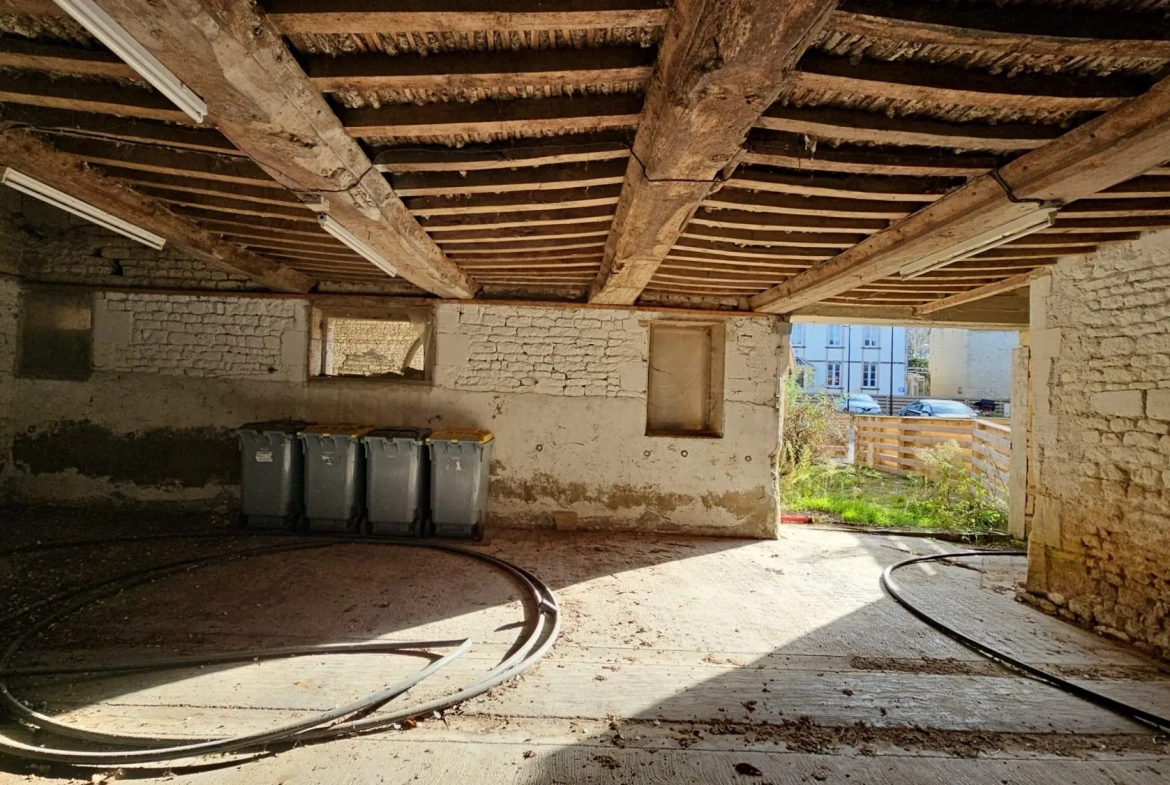 Lot de 3 granges à rénover dans un corps de ferme à Moulins-en-Bessin 