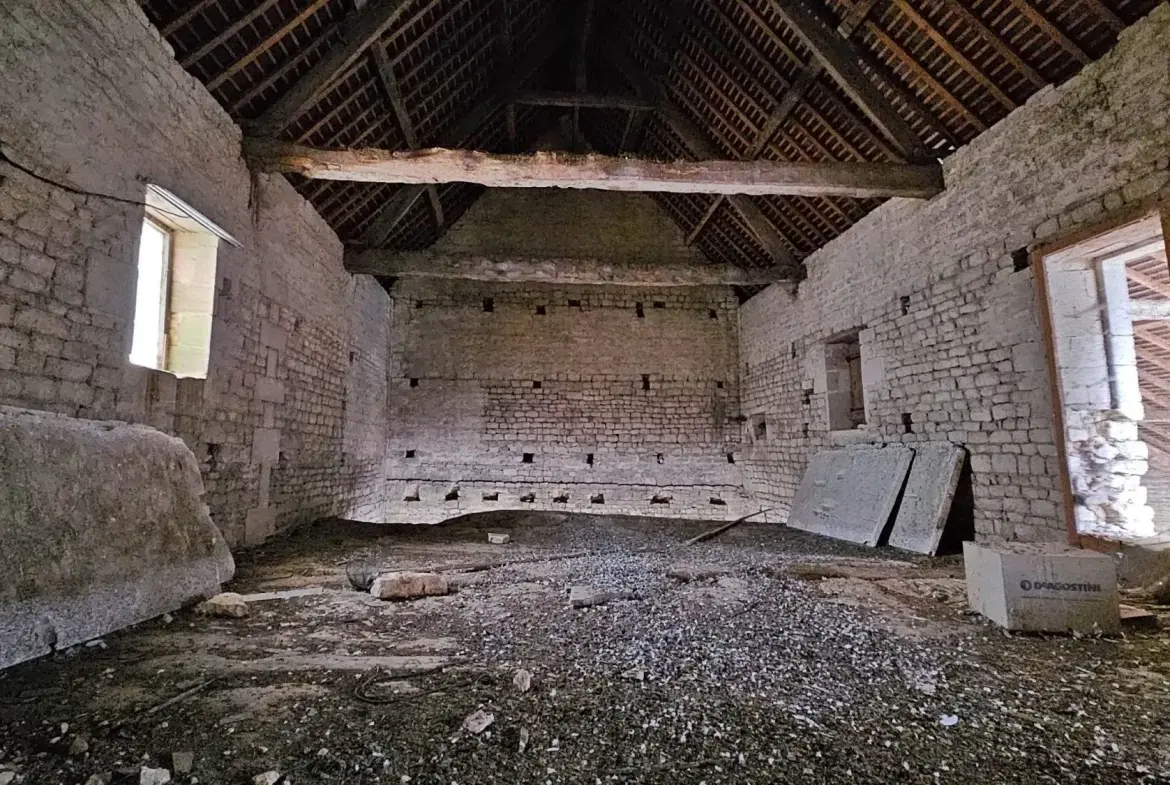 Lot de 3 granges à rénover dans un corps de ferme à Moulins-en-Bessin 