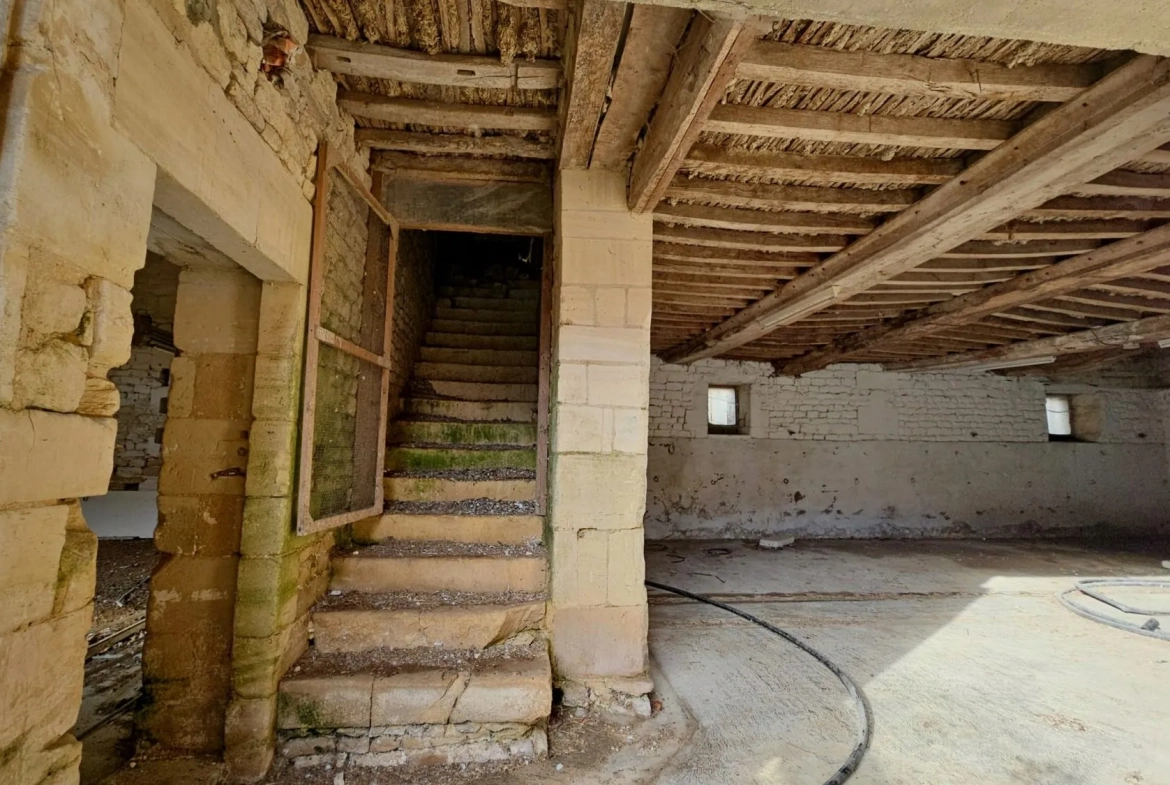 Lot de 3 granges à rénover dans un corps de ferme à Moulins-en-Bessin 