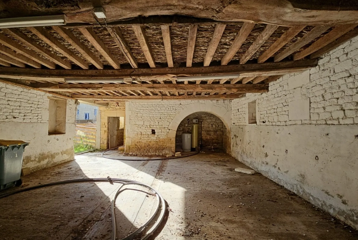 Lot de 3 granges à rénover dans un corps de ferme à Moulins-en-Bessin 