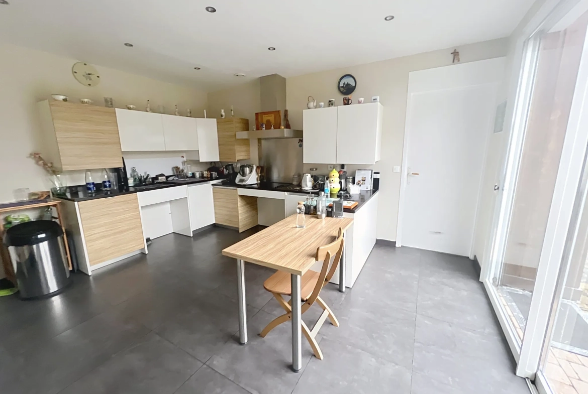 Maison en plain-pied de 120m² avec jardin, garage et rénovation récente à Roubaix 