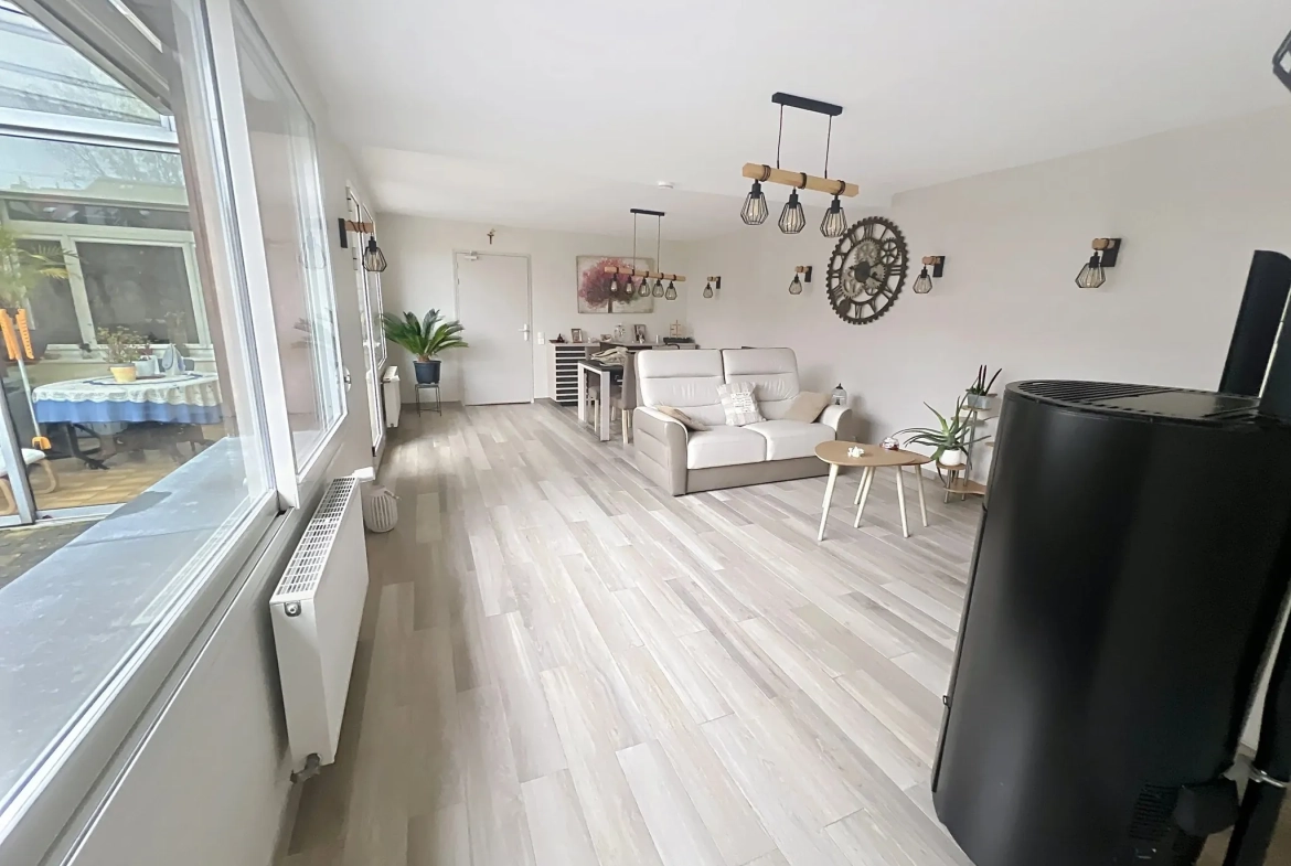 Maison en plain-pied de 120m² avec jardin, garage et rénovation récente à Roubaix 
