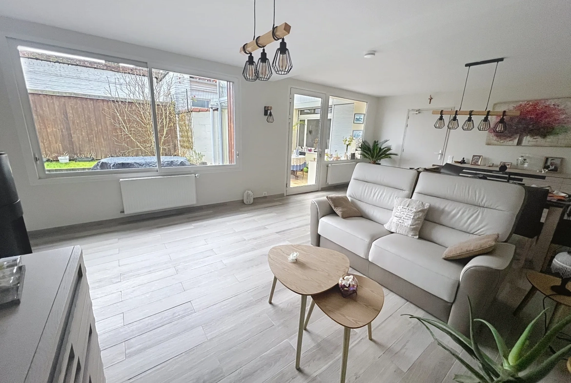 Maison en plain-pied de 120m² avec jardin, garage et rénovation récente à Roubaix 