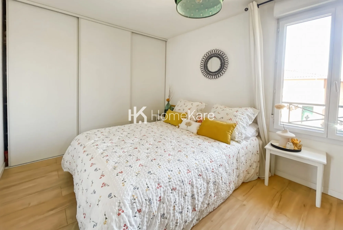 À vendre maison mitoyenne de 85 m² à Bressols avec jardin et garage 