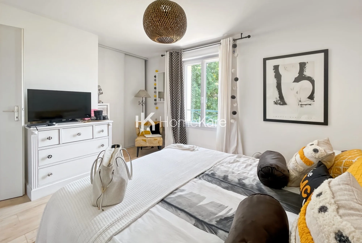 À vendre maison mitoyenne de 85 m² à Bressols avec jardin et garage 