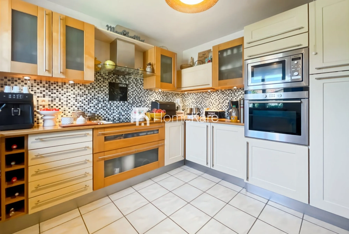 À vendre maison mitoyenne de 85 m² à Bressols avec jardin et garage 