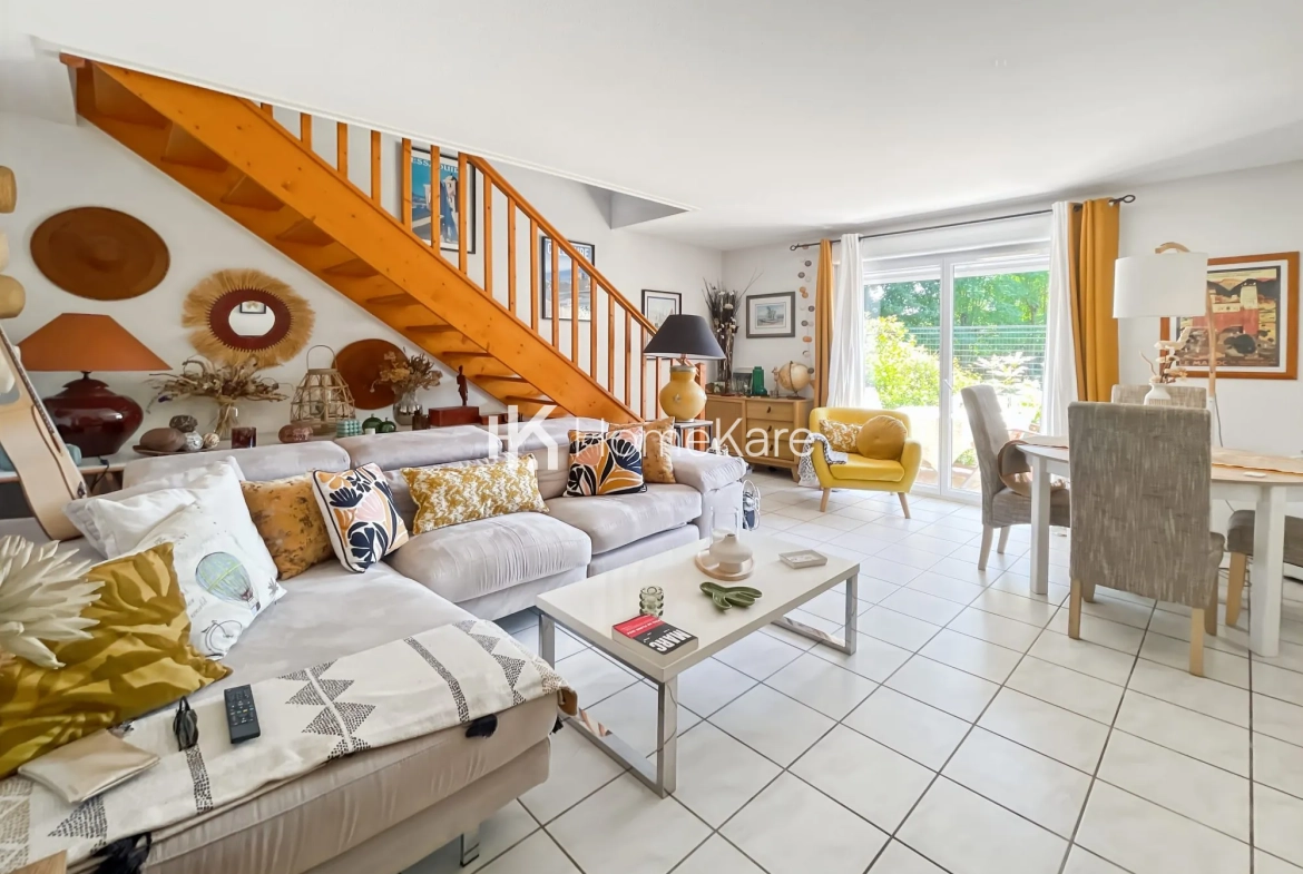 À vendre maison mitoyenne de 85 m² à Bressols avec jardin et garage 