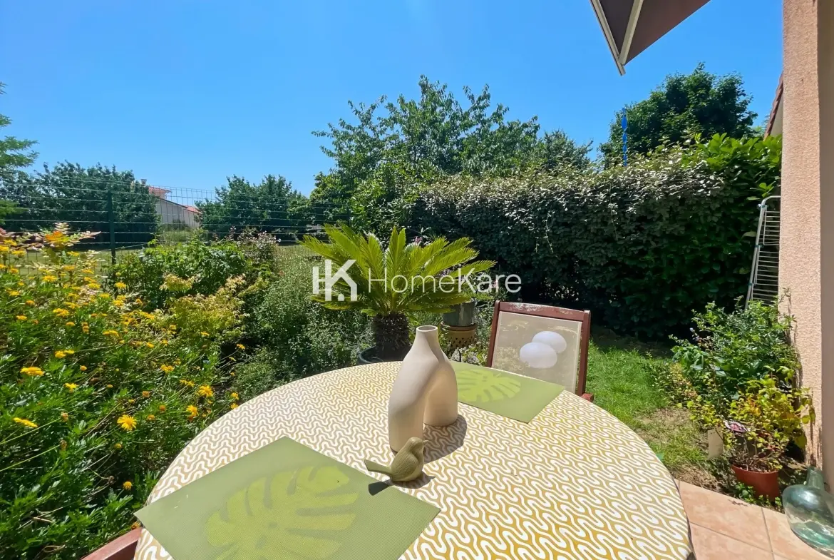 À vendre maison mitoyenne de 85 m² à Bressols avec jardin et garage 