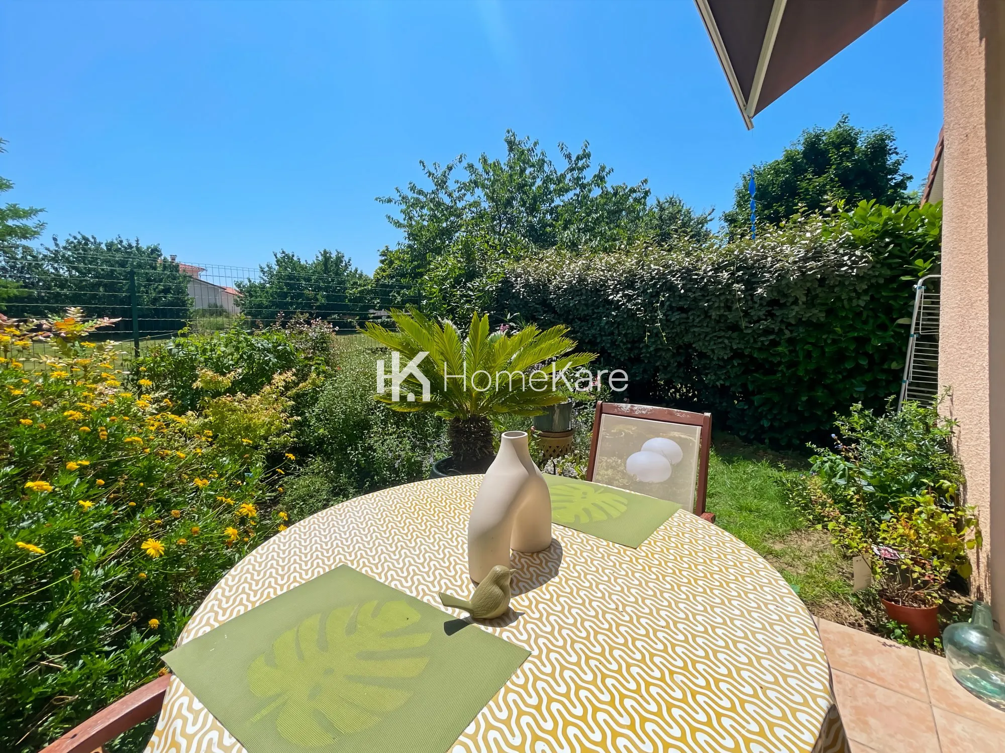 À vendre maison mitoyenne de 85 m² à Bressols avec jardin et garage 