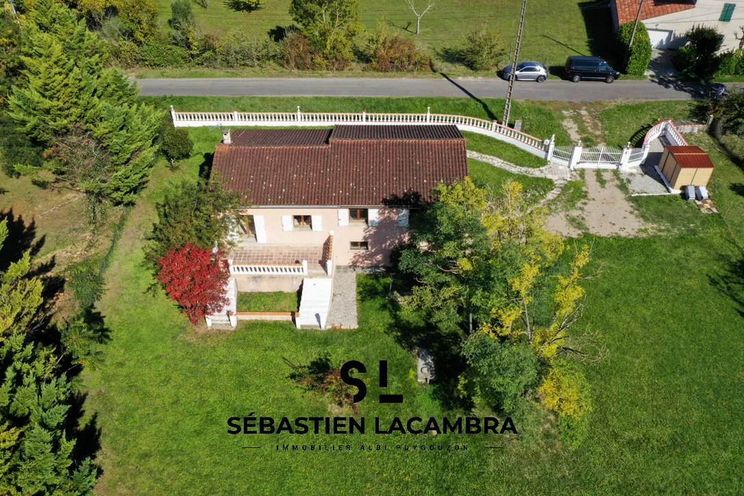 Maison familiale avec vue panoramique et terrain arboré à Senouillac 