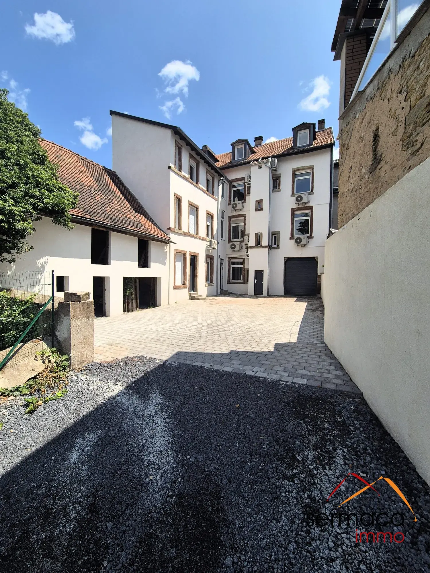 façade cour arrière Appartement T2 rénové avec cave et parking à Sarreguemines - 41,18 m² 