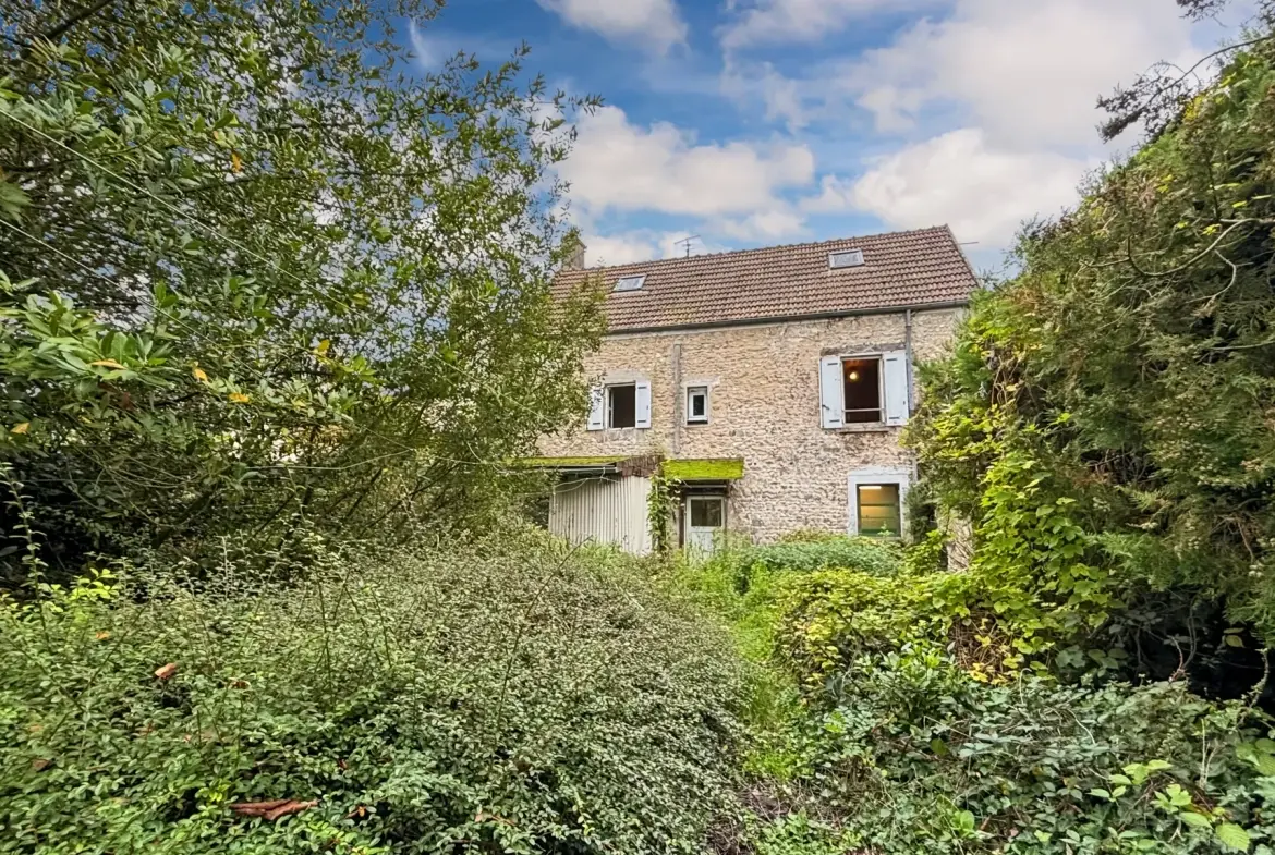 Maison en pierre à vendre à Étampes de 97 m² avec jardin et potentiel d'extension 