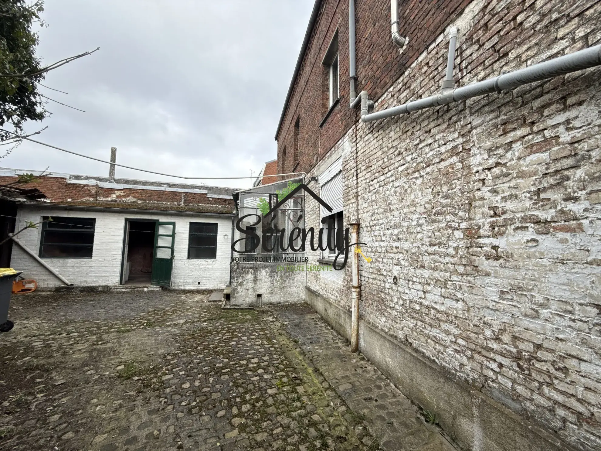 Maison bourgeoise à Caudry de 260 m² à rénover avec potentiel exceptionnel 