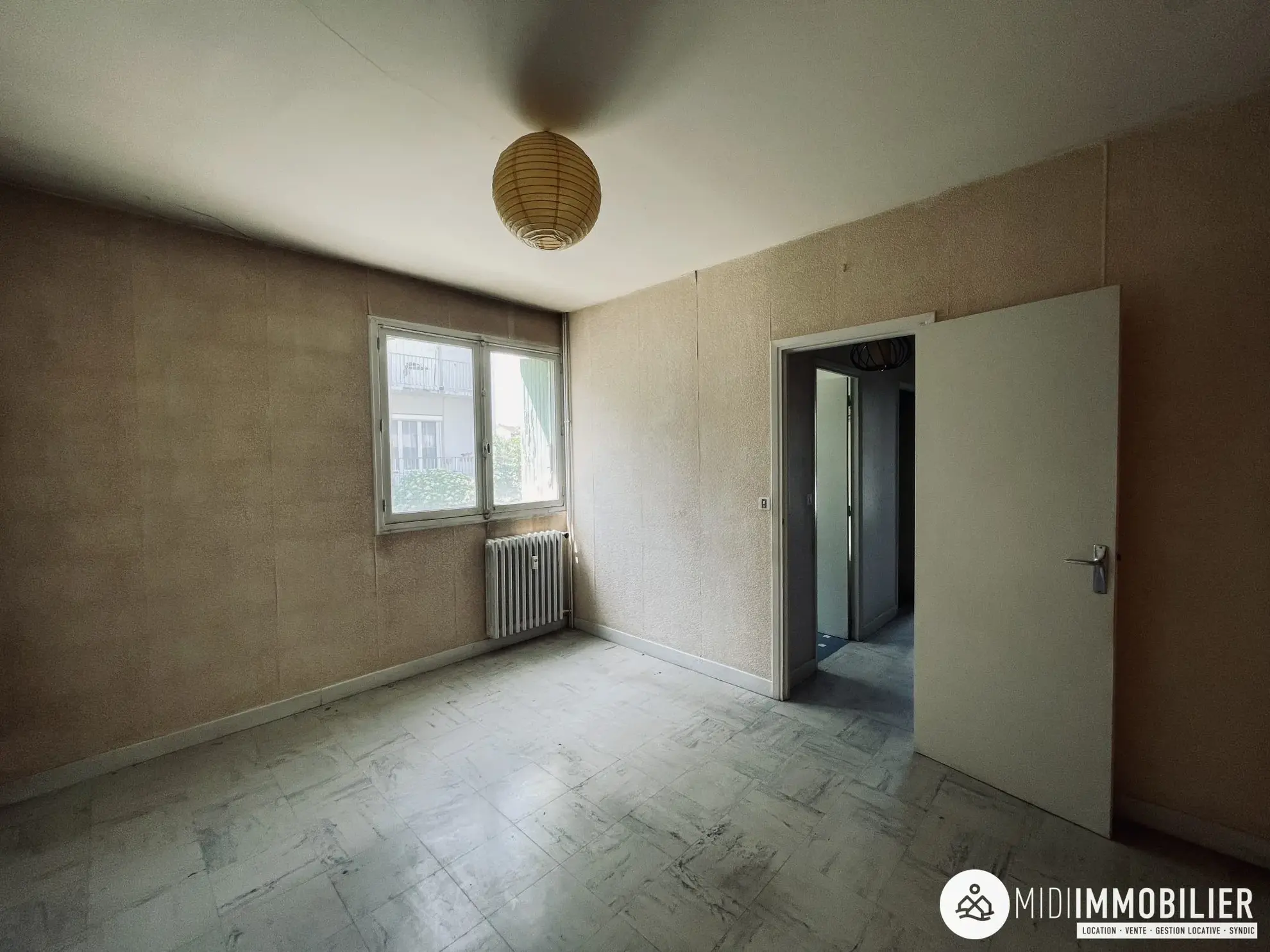 Appartement T3 à vendre à Albi, proche du centre, avec cave et travaux à prévoir 