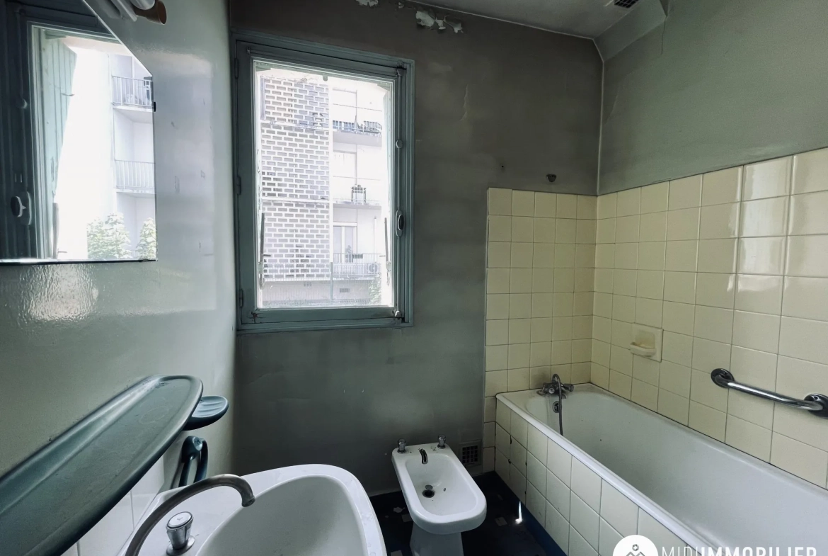 Appartement T3 à vendre à Albi, proche du centre, avec cave et travaux à prévoir 
