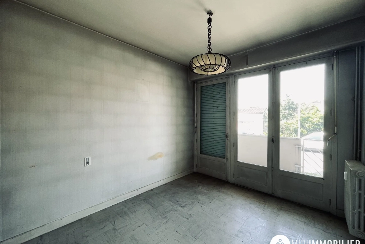 Appartement T3 à vendre à Albi, proche du centre, avec cave et travaux à prévoir 