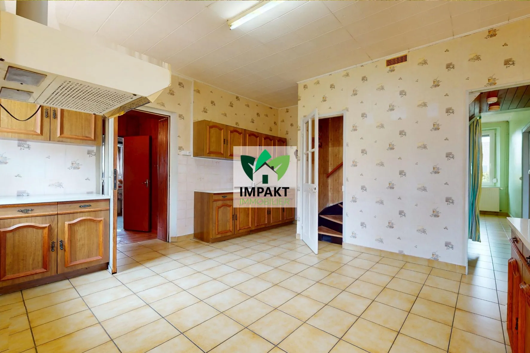 Maison ancienne à vendre à Champagney avec jardin et potentiel de rénovation 
