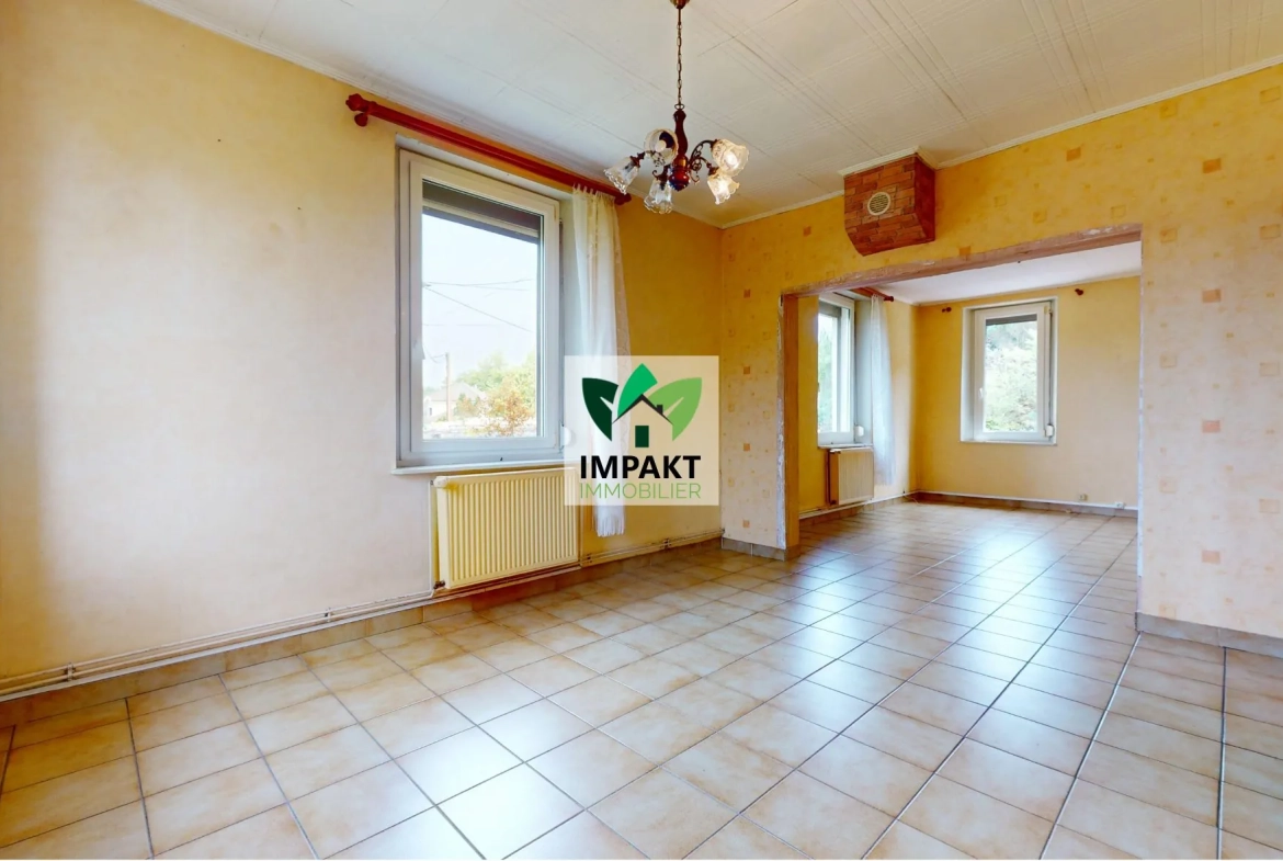 Maison ancienne à vendre à Champagney avec jardin et potentiel de rénovation 