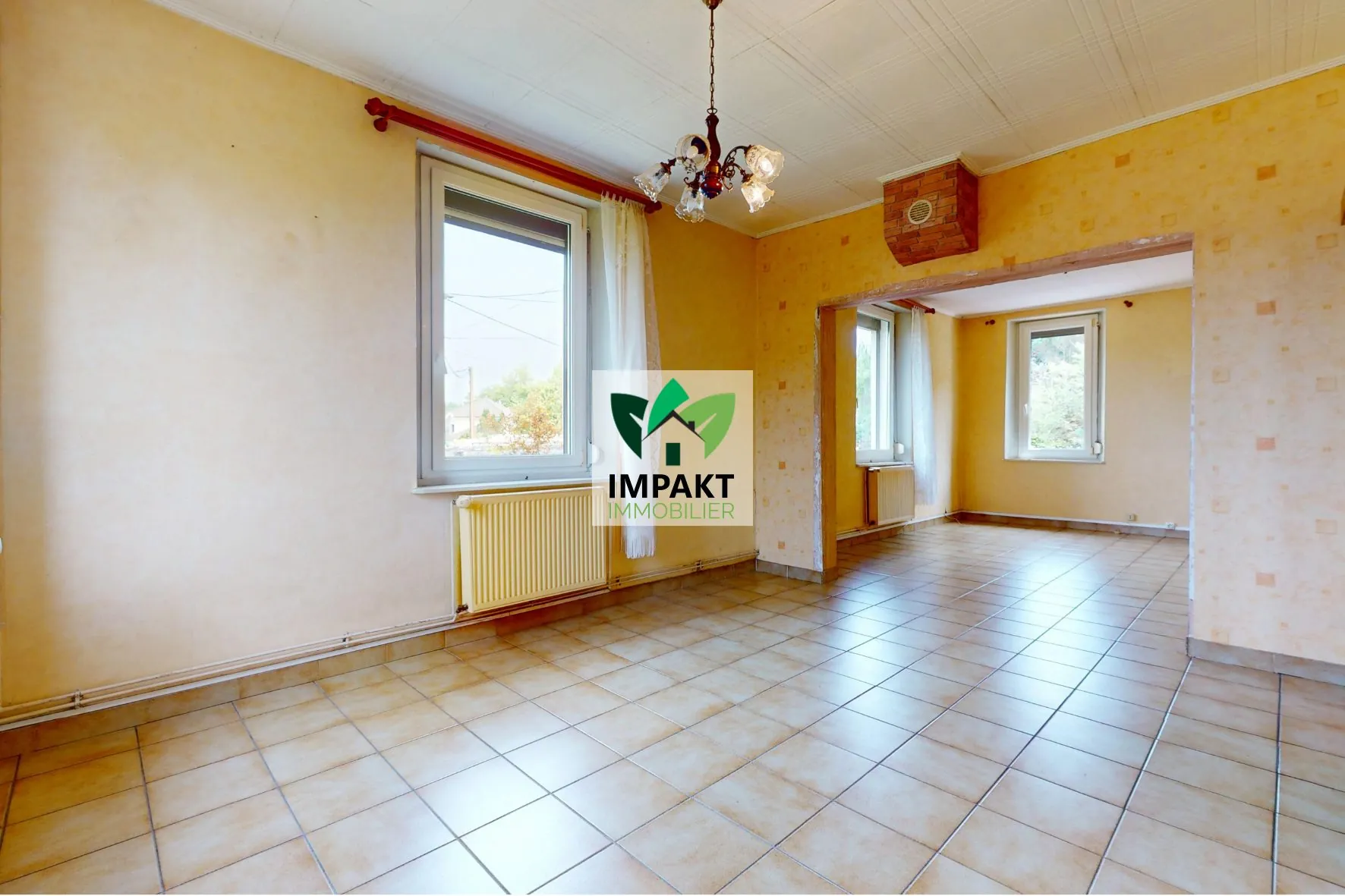 Maison ancienne à vendre à Champagney avec jardin et potentiel de rénovation 