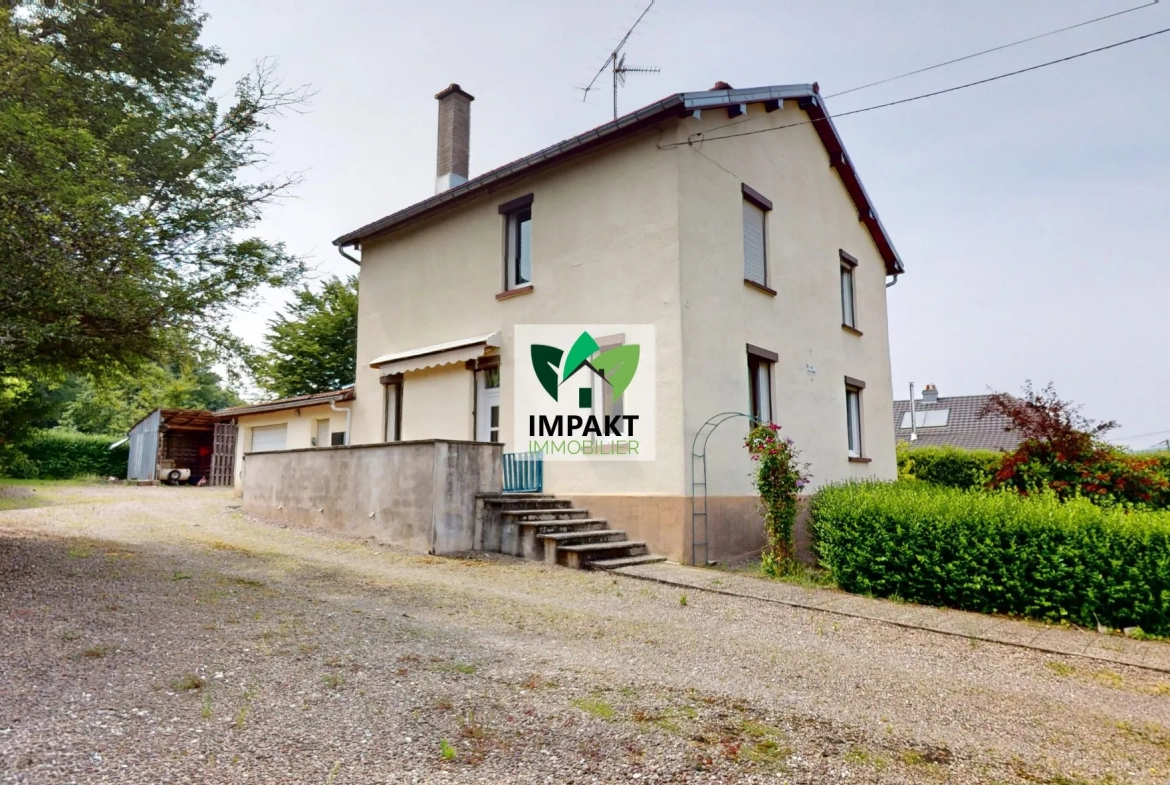 Maison ancienne à vendre à Champagney avec jardin et potentiel de rénovation 