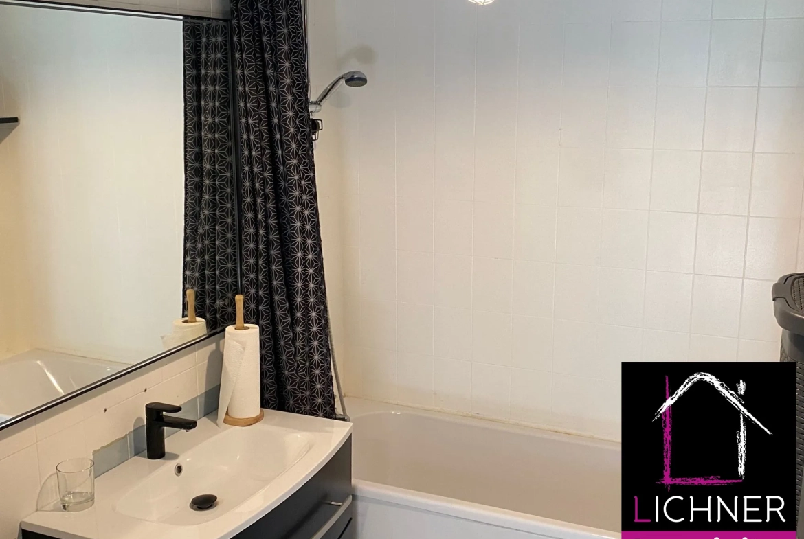 Appartement F2 de 61 m² à Forbach avec parking, cave et balcons 